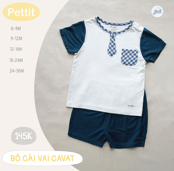 alt text: Bé trai mặc bộ cài vai cavat