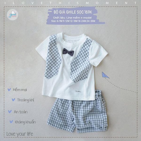 alt text: Bé trai mặc đồ bộ giả ghi lê kẻ sọc