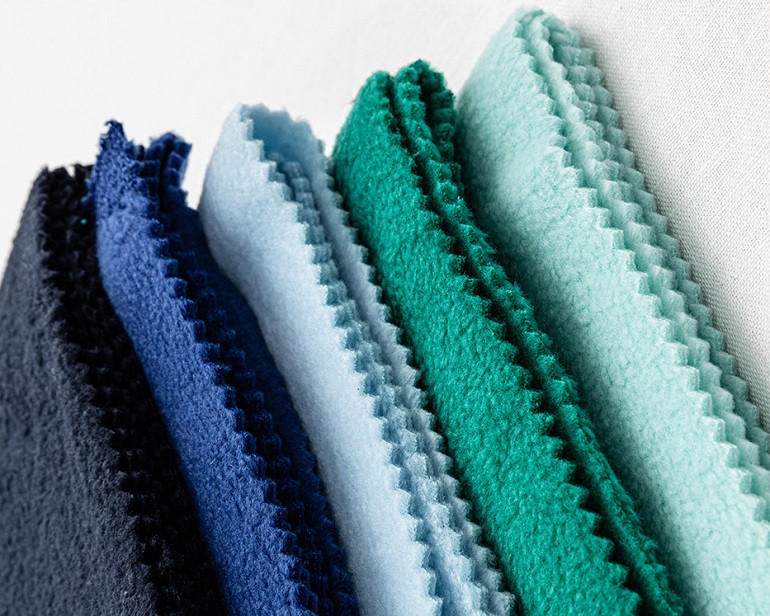 alt text: Vải nỉ Hàn Quốc với màu sắc đa dạng